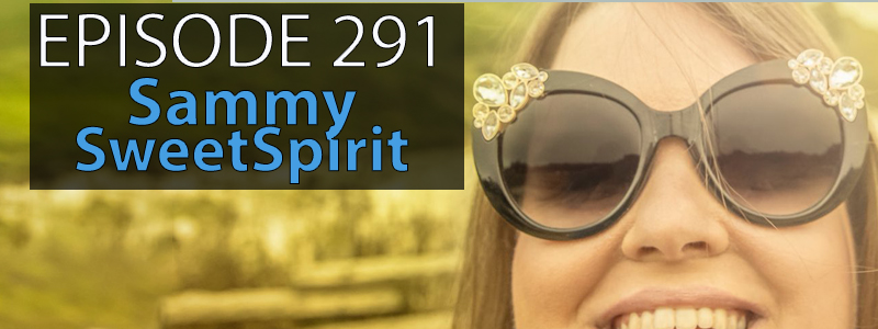 Sammy SweetSpirit, a young blond woman wearing sunglasses, smiles as the sun sets against a green field in the background. The words "Episode 291 - Sammy SweetSpirit" hover over the left hand side of the image.