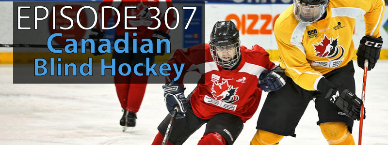 Two opposing hockey players, one wearing red and black and the other wearing yellow and black jostle against each other as both attempt to reach the puck. The words "Episode 307 - Canadian Blind Hockey" sits at the upper right hand corner of the image while the AT Banter logo sits in the lower right hand corner.