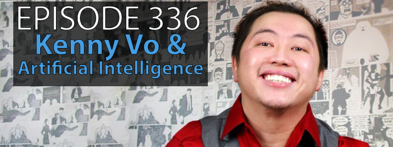 Kenny Vo, a man in his 20s, smiles in a red dress shirt and grey vest against a backdrop of comic book wallpaper.